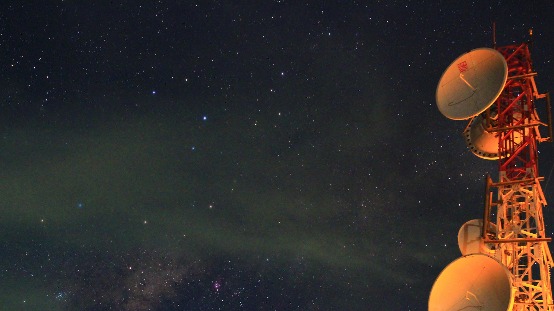 a night sky, with microwave tower, maybe supplying internet to a remote region?
