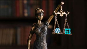 Statue of woman holding scales of justice balancing logos for WordPress and WP Engine